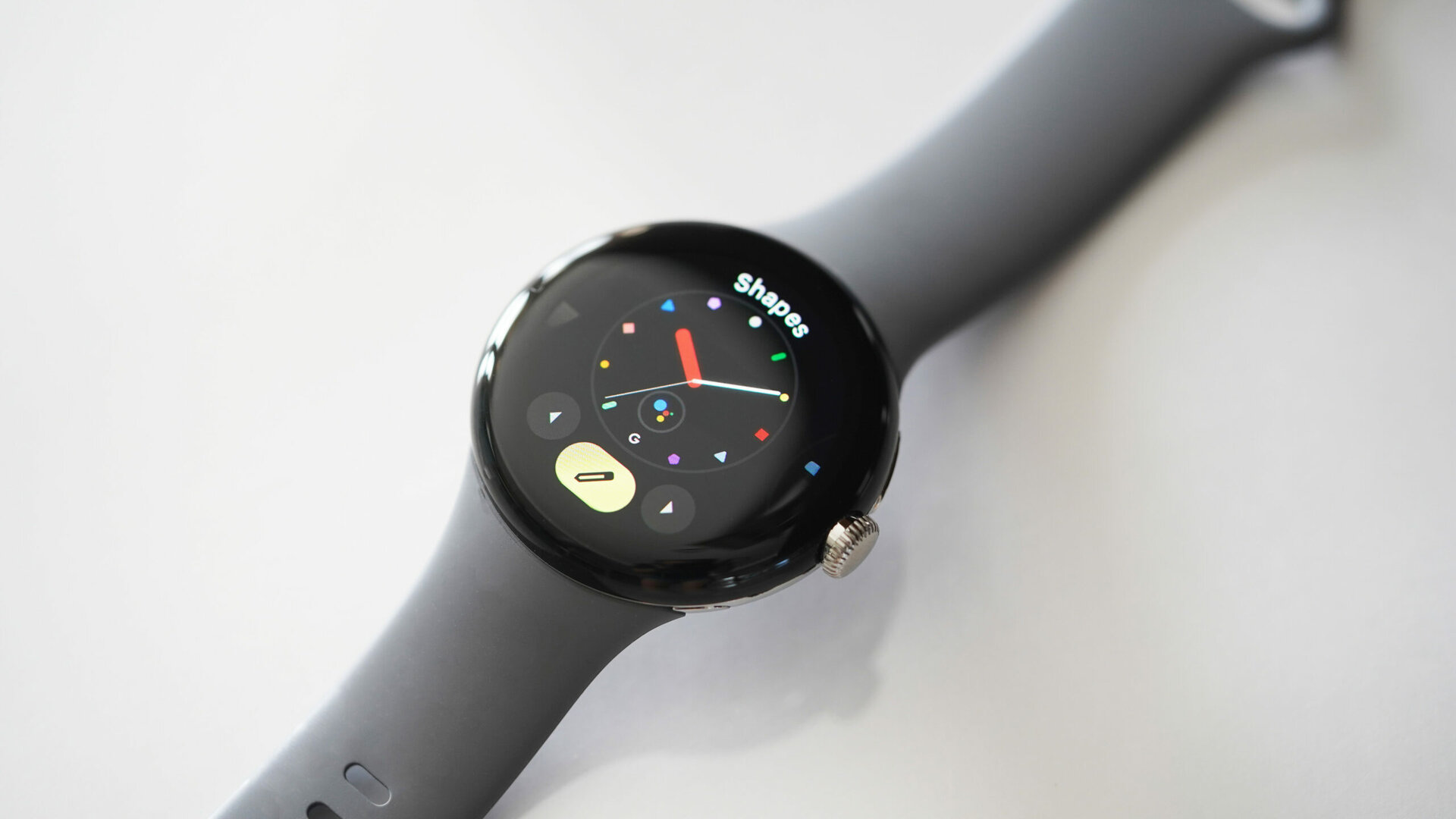 A Google Pixel Watch displays the Edit screen for personalizing your watch face.